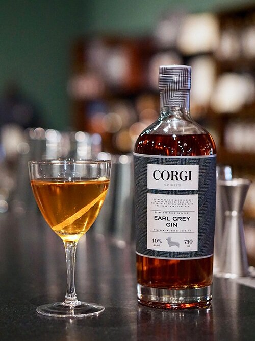 EARL GREY MARTINI 2.5 oz Corgi Spirits Earl Grey Gin 0.5 oz dry vermouth Lemon twist for garnish Fill a mixing glass with ice, add gin and vermouth. Strain into a chilled cocktail glass. Add garnish.