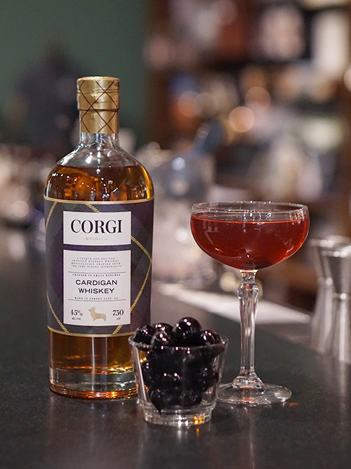 MANHATTAN   2 oz Corgi Spirits Cardigan Whiskey  1 oz sweet vermouth  2 dashes Angostura Bitters    Fill a pint glass with ice. Add all ingredients and stir well. Strain into a chilled coupe and garnish with a cherry.